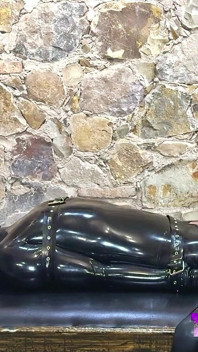 Rubber Slave Is Used Sexually