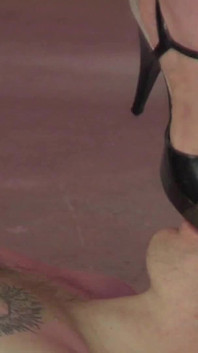 Redhead mistress rides on his face