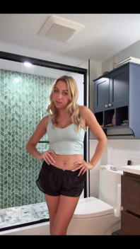 Squatting and peeing over the toilet