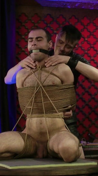 Zeus Ballgagged and Bondage in Rotate Table