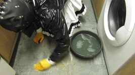 Maid Scrubs a Filthy Kitchen Floor