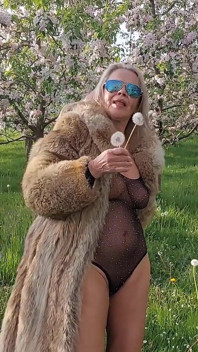 Mature Woman Is Walking Around Outside in a See-through Bodysuit!