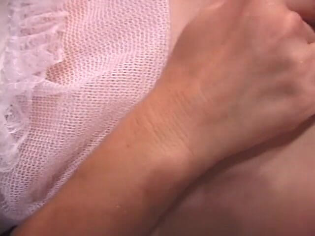 Solo Sensations: Horny mature slut in maid's uniform rubs her pussy and...