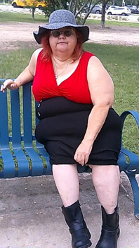 Nurse Vicki Smoking in the Park on a Bench All Dressed up