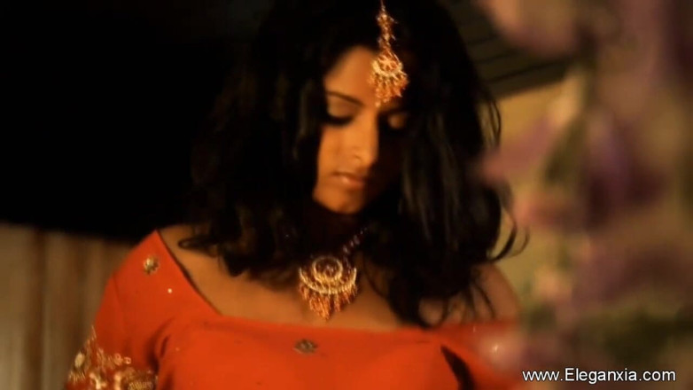 Eleganxia: Exotic Indian babe playing with something different