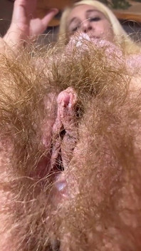 Closeup on My Hairy Cunt While Smoking a Cigar