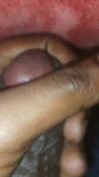 A Man Is Pleasuring Himself in the Comfort of His Own Bedroom.