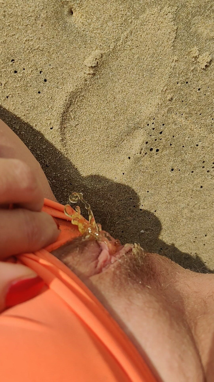 Abella Love: Exhibitionist Girl with Sand in Her Panties Pissing on the...