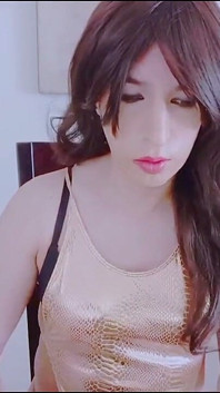 Crossdresser Playing Alone