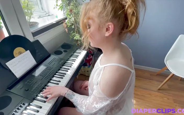 Nicole White: Playing on Keyboard.