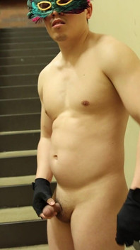 Flexing by the Stairs at the Gym