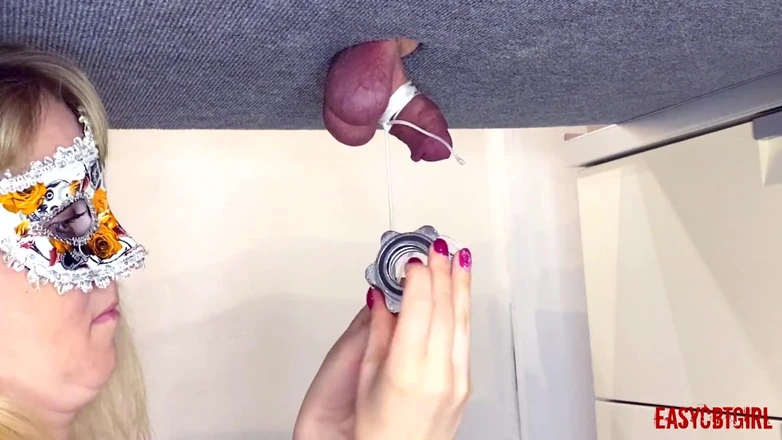 AnnyCandyPainboy: Mistress Plays with the Slave's Dick and Hangs Weights on...