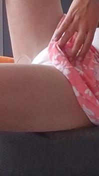 Sexy Crossdresser in Mini Skirt and High Heels
