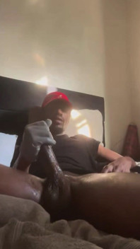 Masturbating