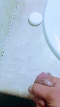 Masturbating