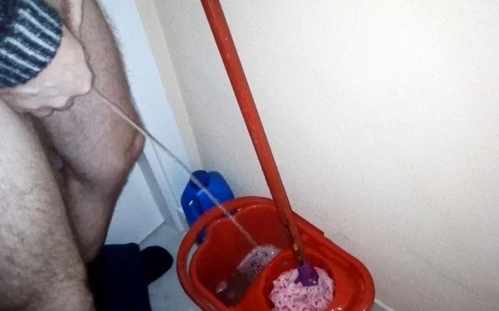 Sex hub male: John is taking a piss into the cleaning bucket