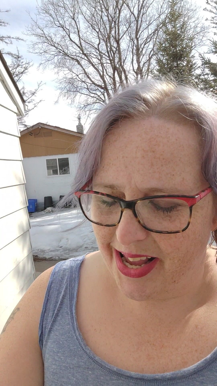 AngYourDirtyCanadian: Calm Outdoor Smoking Moment with a Playful Lipstick Look