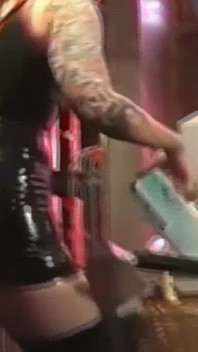 Tattooed Latex Mistress Dominates Her Collared Male Slave
