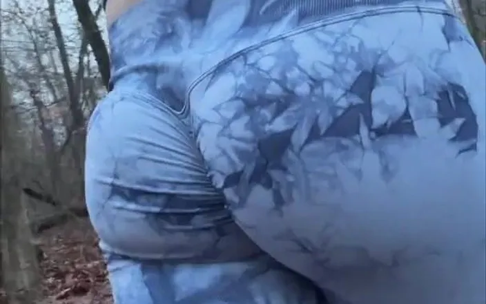 Little Butt: Bubble butt femboy walking in leggings outdoors