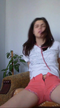 Kinky Redhead Spred Her Legs and Pee in Her Short Pants
