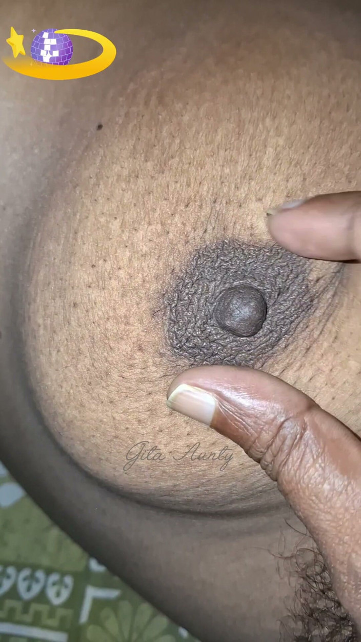 Indian aunty sex: Video of an Indian Bengali Woman's Breast Being Squeezed