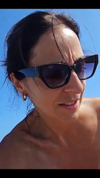 Between and Passers-by, We Try to Relax on the Beach