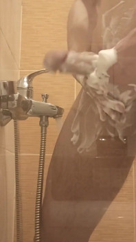 A Young Guy Washes in the Shower and Dreams of Someone Being Next to Him