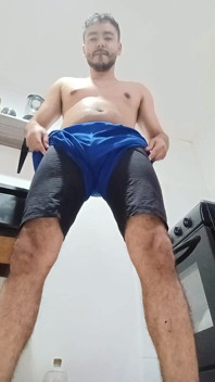 Man Masturbating in Shorts in His Kitchen