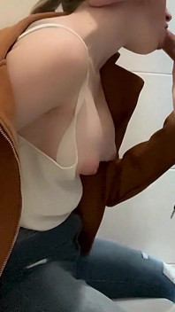 Busty Blonde Sucks Cock in the School Bathroom