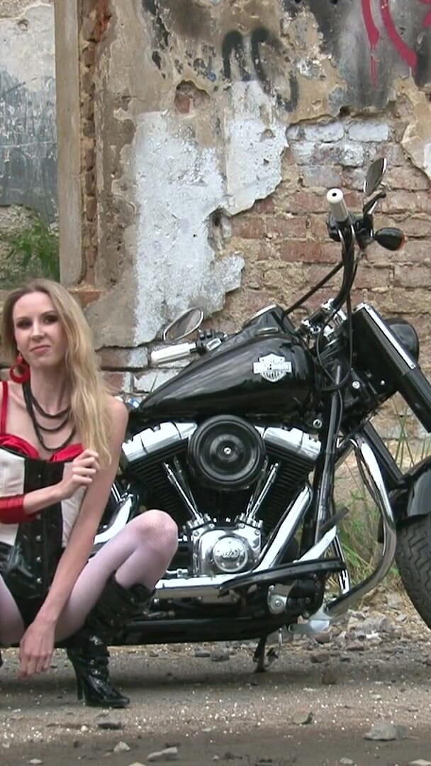 Skinny blonde on a bike (Public Entertainment) Skinny blonde on a bike (Public Entertainment)