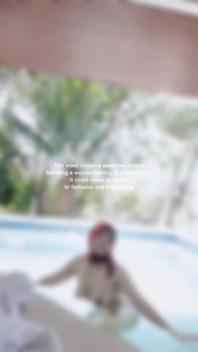 Woman Hijab Bathing Naked in an Open-air Hotel Pool