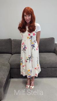 A Redhead in a Dress