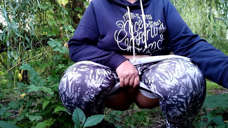 Elena: Lush MILF golden shower solo in nature