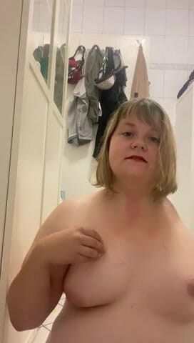 Deutsche Anna: Amputee Girl Is Playing with Some Cold Ice Cubes
