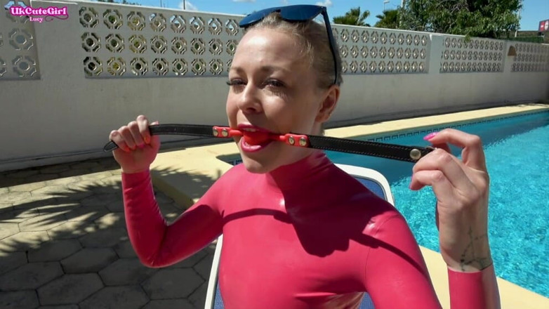 UKCuteGirl Lucy Lauren: Sunbathing Gagged in Latex - Shiny Messy Drool Whore