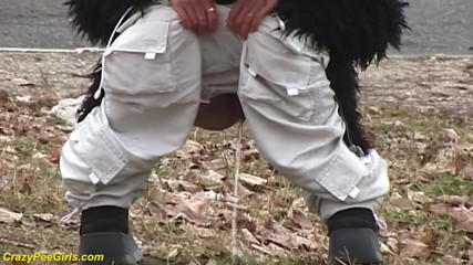Crazy pee girls: Young girl pissing on street