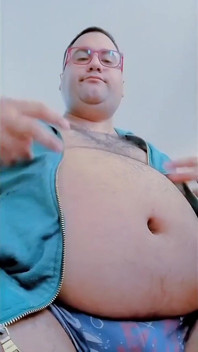 Fat Man Having Lunch and Touching His Belly