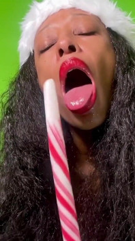 Close-up Candy Cane Lick, Gag and Spit