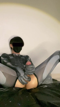 Black Spider Squirting Water