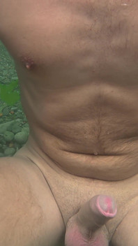 A Teenage Boy Swims Naked in the Sea