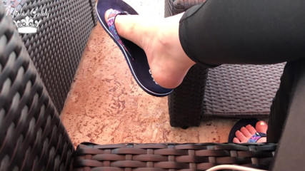 Goddess Misha Goldy: Flip flops dangling outdoor near lake with silver nails & toes...
