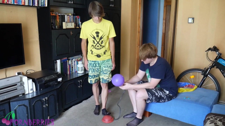 Ethan Alex: Thin, black socks blowing up balloons + footjob