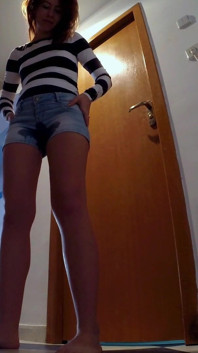 Skinny Redhead Pee in Her Short Jeans