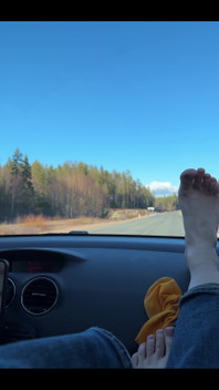 Feet on the dashboard