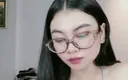 Jonathan Camberg: Beautiful Asian Woman Shows Off Cleavage