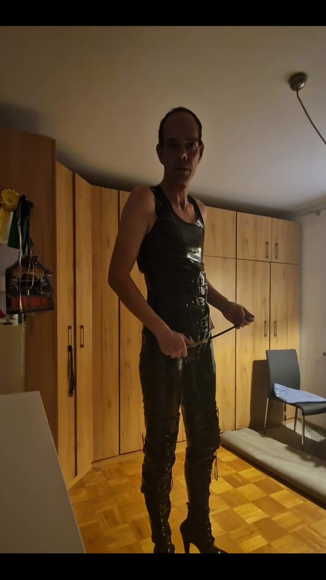 In Latex and Boots 1 (Gentle Dom) In Latex and Boots 1 (Gentle Dom)