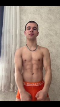 Cute Athlet Boy Showing Muscle