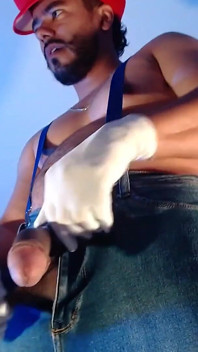 Dressed as Mario Bros Playing with His Plumbing Tool