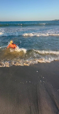 Try Not to Wet My Hair While Play with the Waves