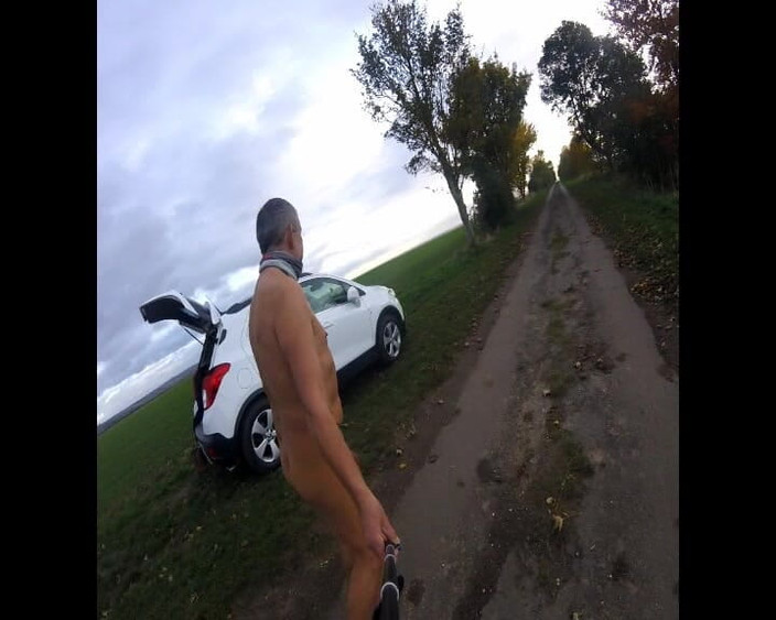 Andy: Naked Round the Car